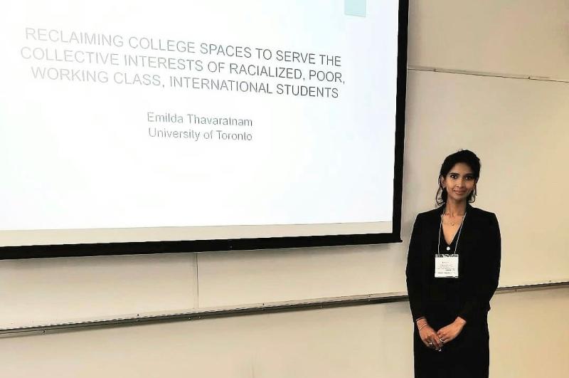 Emilda Thavaratnam presents her research at a conference.